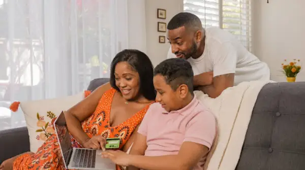 Teen Showing Store Idea to His Parents